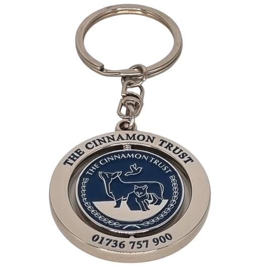 Cinnamon Trust Enamel Spinner Keyring